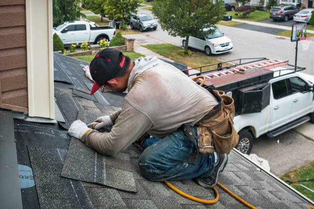 Professional Roof Replacement technician working in Lanoka Harbor, NJ
